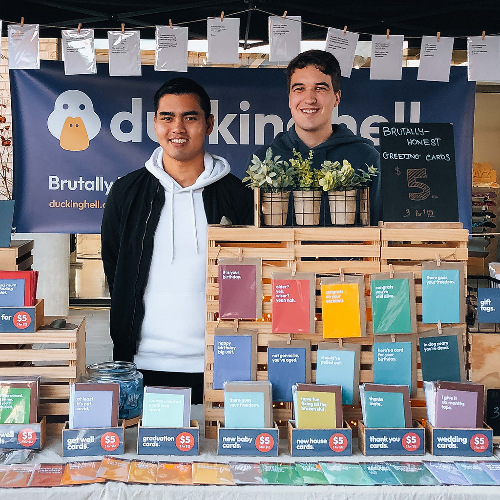 Founders of ducking hell. Greeting Cards at the craft market stall in Auckland, New Zealand.